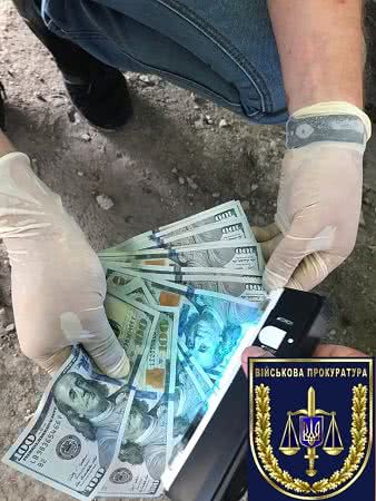 В Одессе майор полиции за взятку не стал задерживать женщину, содержавшую притоны. Фото
